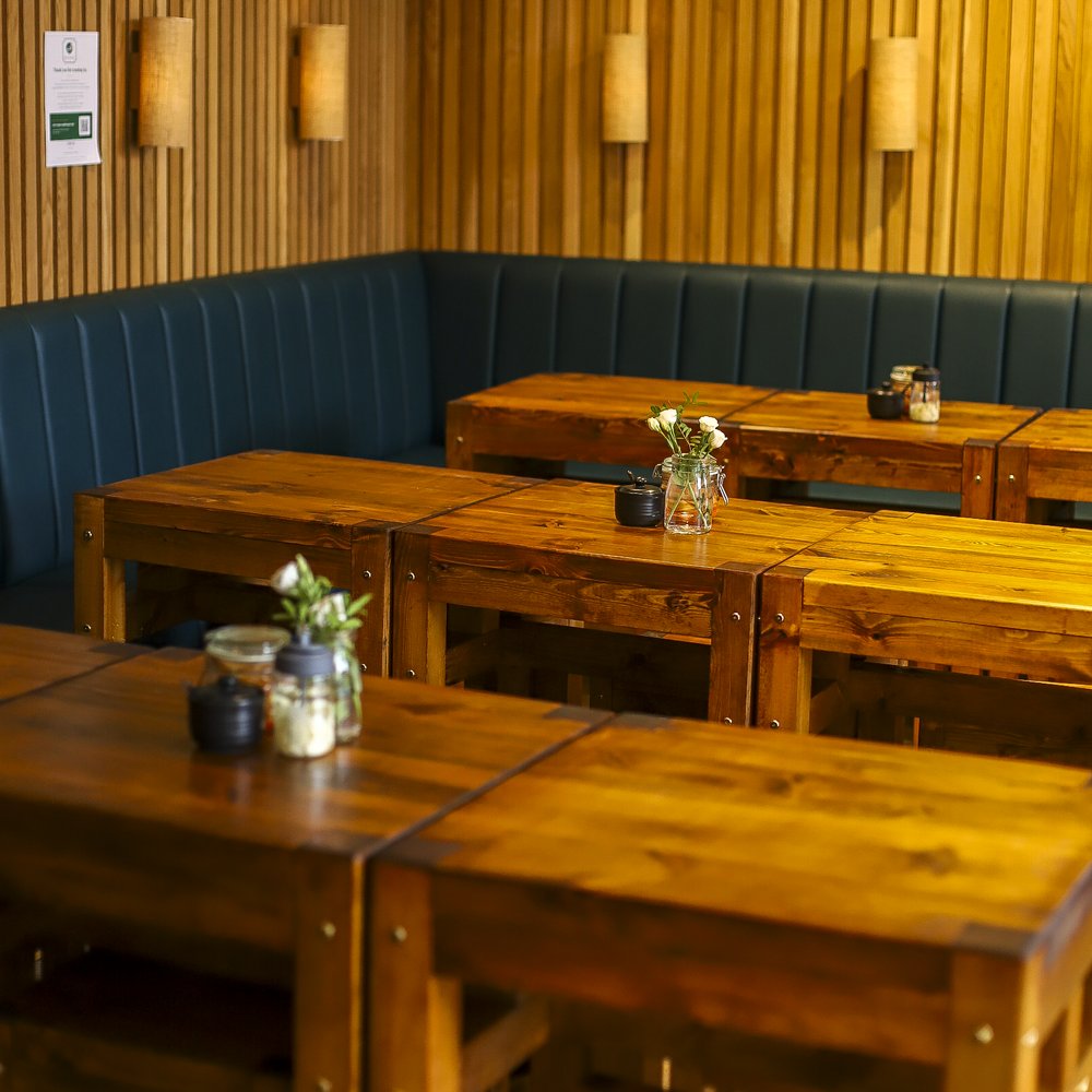 Timber and green interior at Pho & Roll
